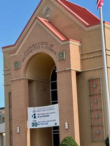 ASMS front entrance with sign celebrating accolades